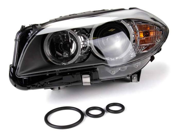 BMW Headlight Assembly - Driver Side (Halogen) 63117203243 - Hella 010131051